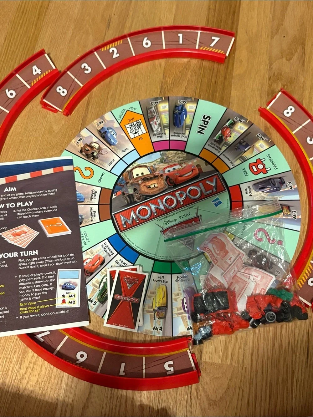 Disney Cars 2 Lightning McQueen Red Monopoly Board Game Racetrack Lightning
